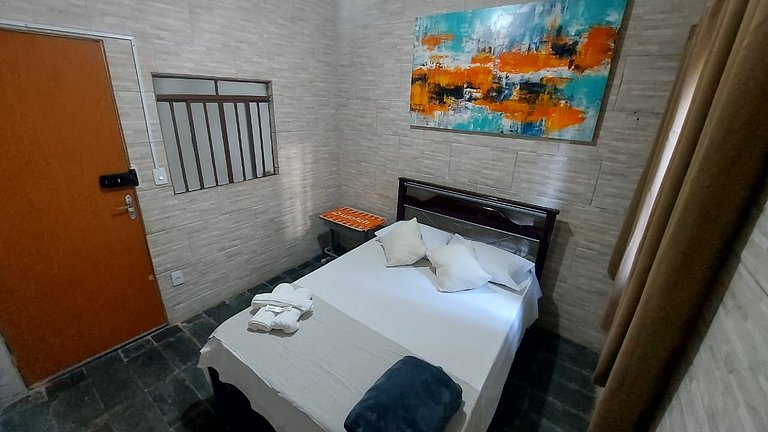 Quarto Aconchegante na Casa Amarela