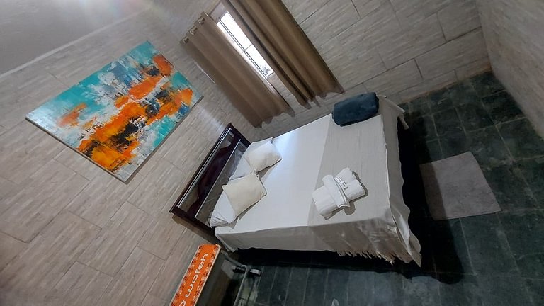 Quarto Aconchegante na Casa Amarela